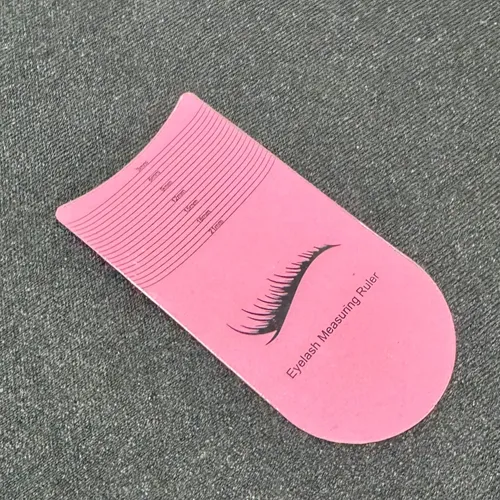 regla de pestañas rosa