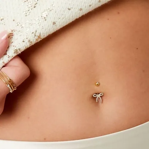 Navel (ombligo) joyería incluida.