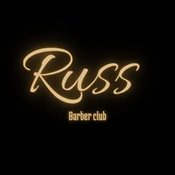 Logo de Russ Barberia 